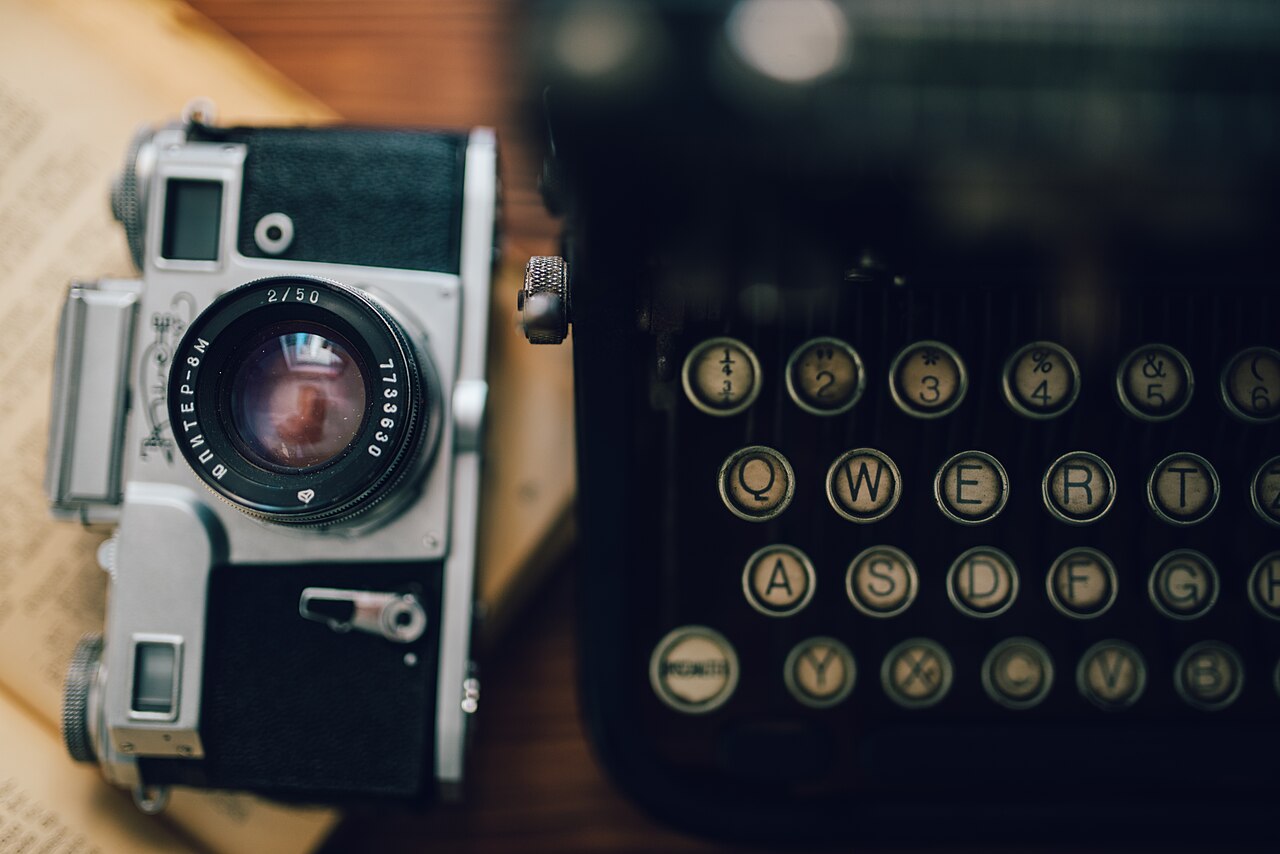 Analog camera and typewriter keyboard from above. (51685050808)