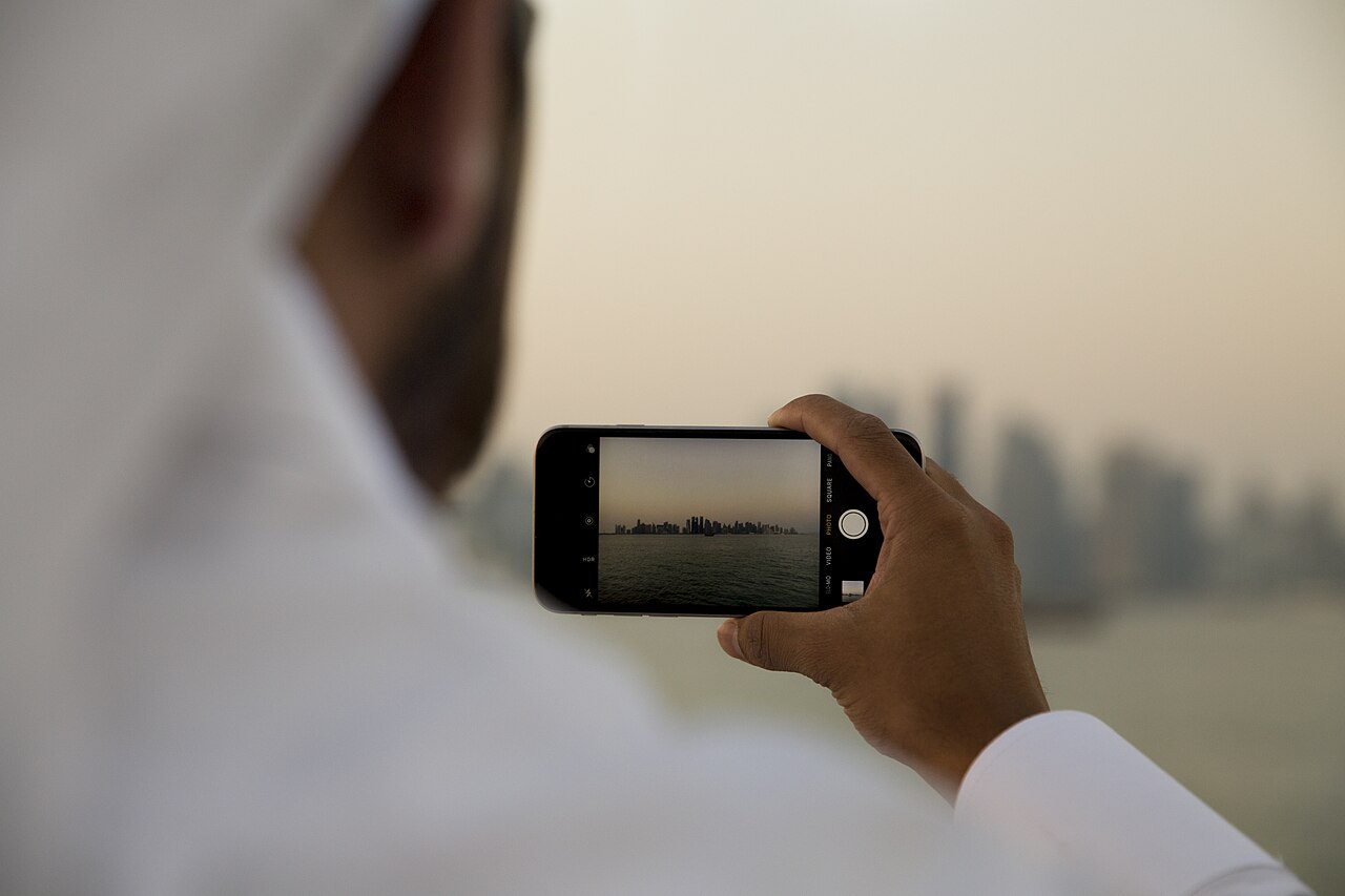 Doha, Qatar being photographed through smartphone